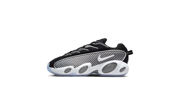 Side view of Drake's black and white Nike sneaker.